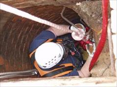 Confined Space Training - Person Going Down Well on Harness