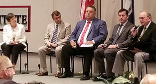 Photo of local leaders during panel discussion