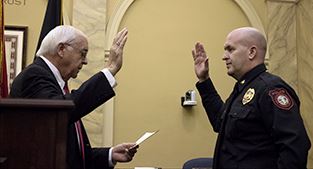 Scott Booth, right, sworn in by Clerk of Circuit Court Gerald Gibson