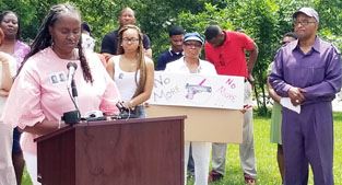 Jean Jackson speaks at rally Monday