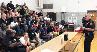 Police chief speaks to kids during first day of academy
