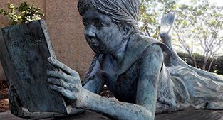 Statue outside main branch of Danville Public Library system