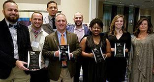 Parks and Recreation staffers display awards