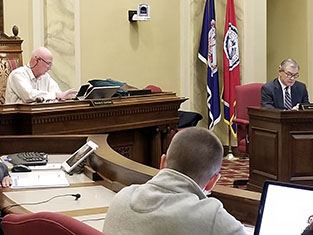 Harold Garrison presides as new chairman of Planning Commission.