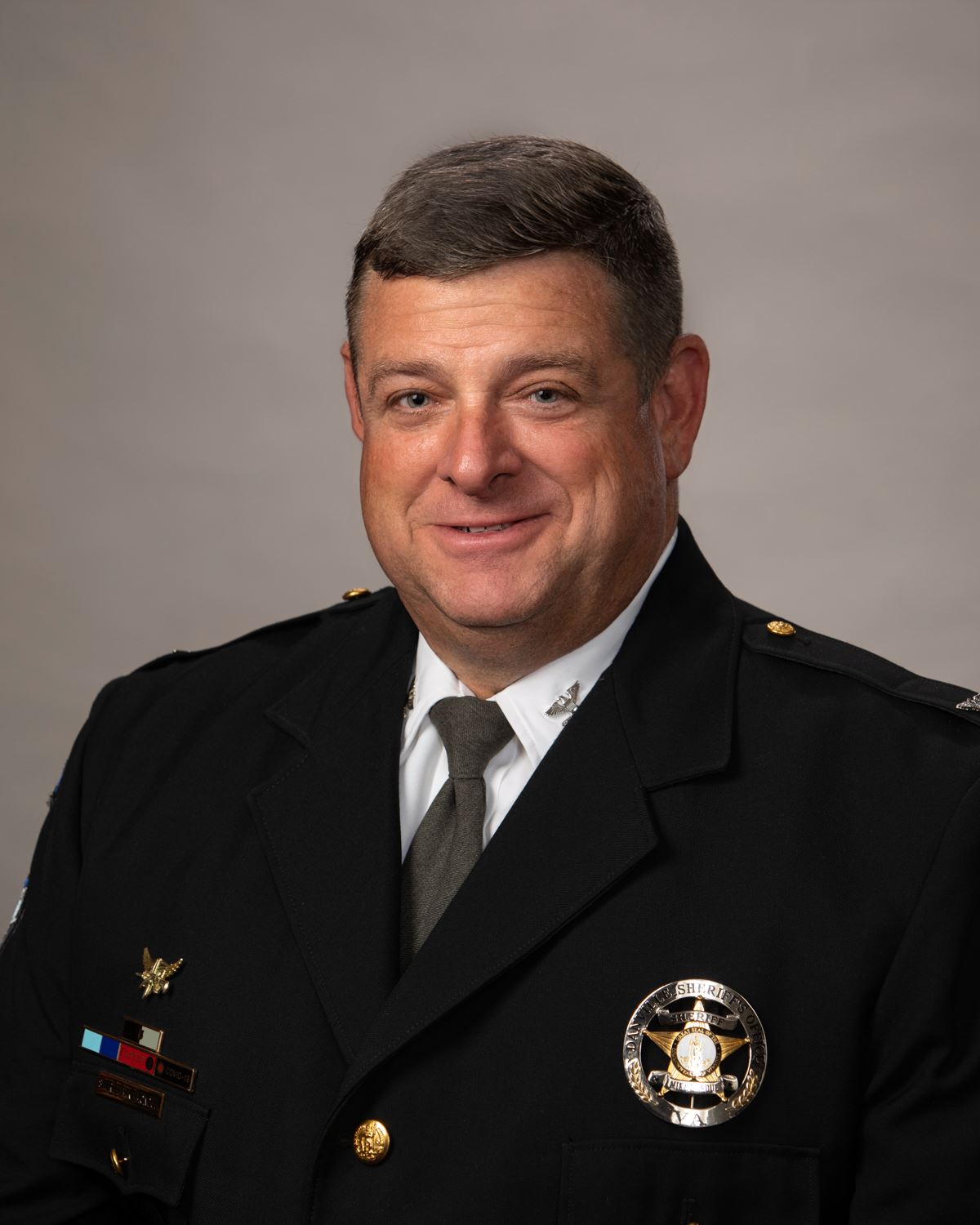 Sheriff Mike Mondul wearing formal uniform.