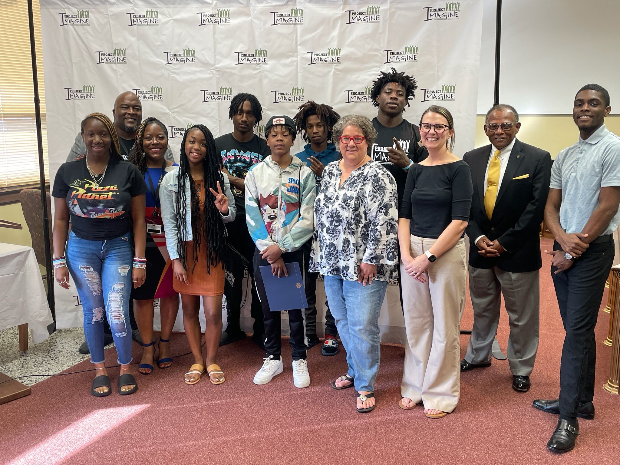 Group shot of Project Imagine graduates and ambassadors