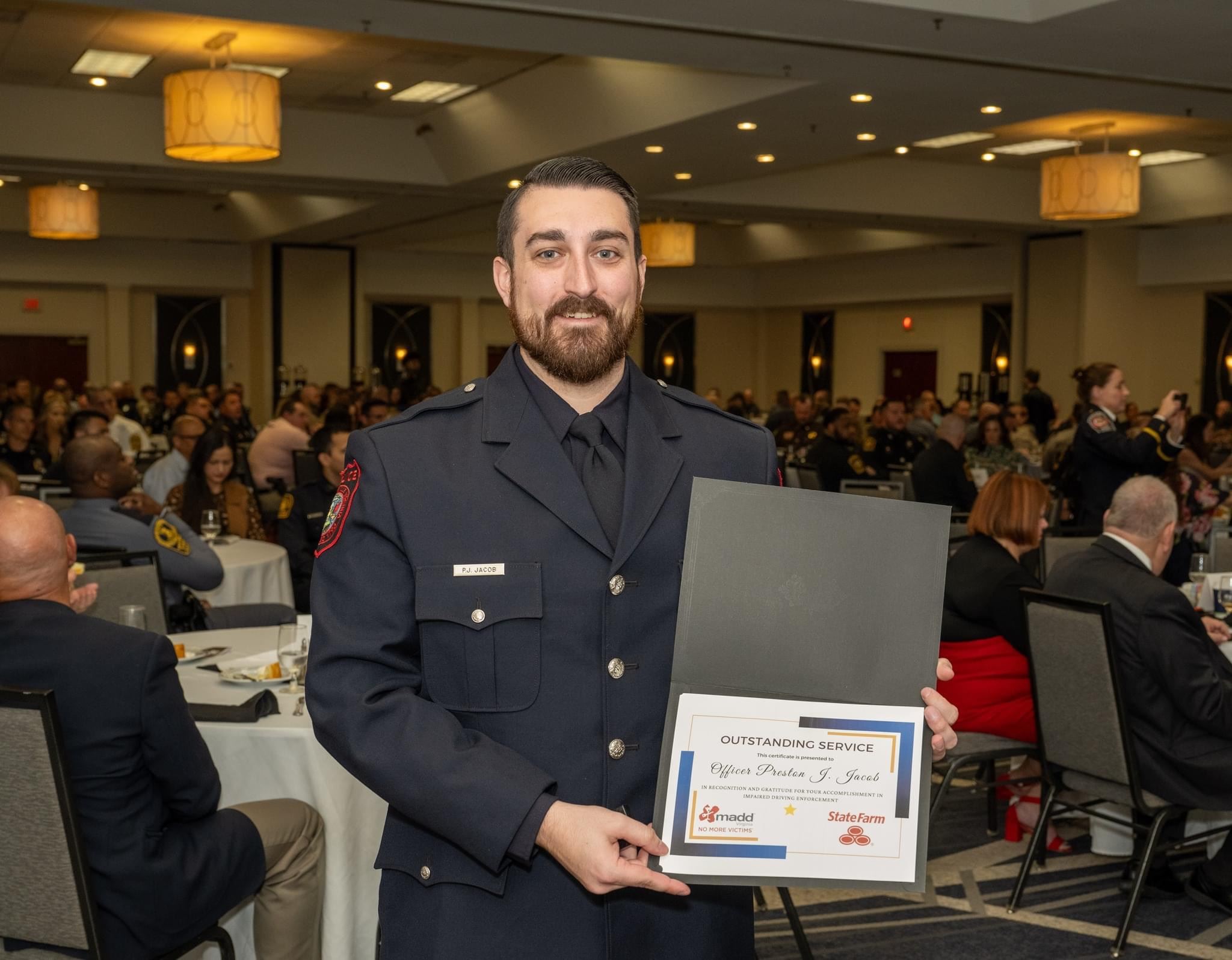 Officer Jacob Preston with the MADD Award