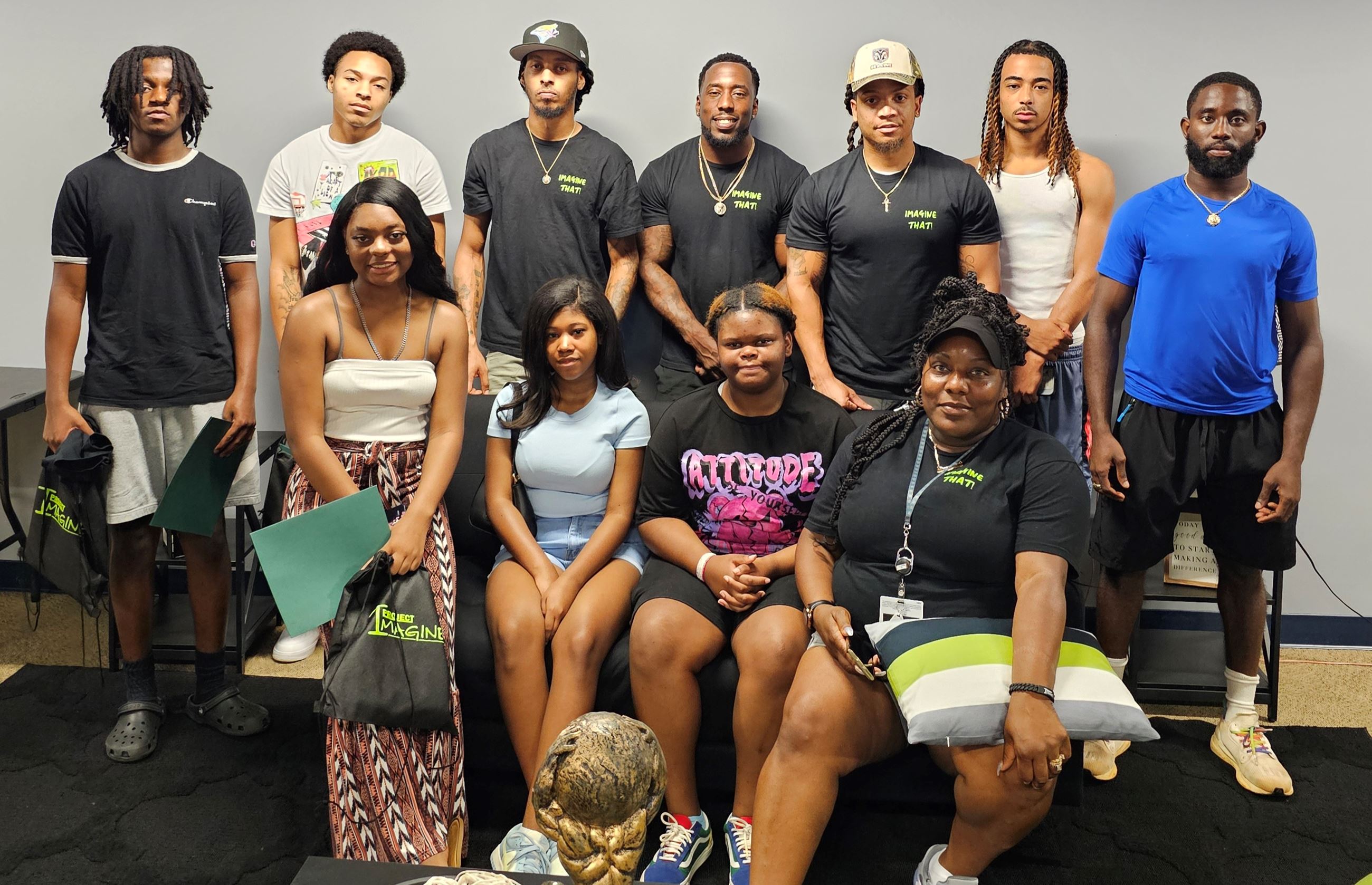 Group photo of the Project Imagine graduates and staff following the Aug. 2, 2024, ceremony.