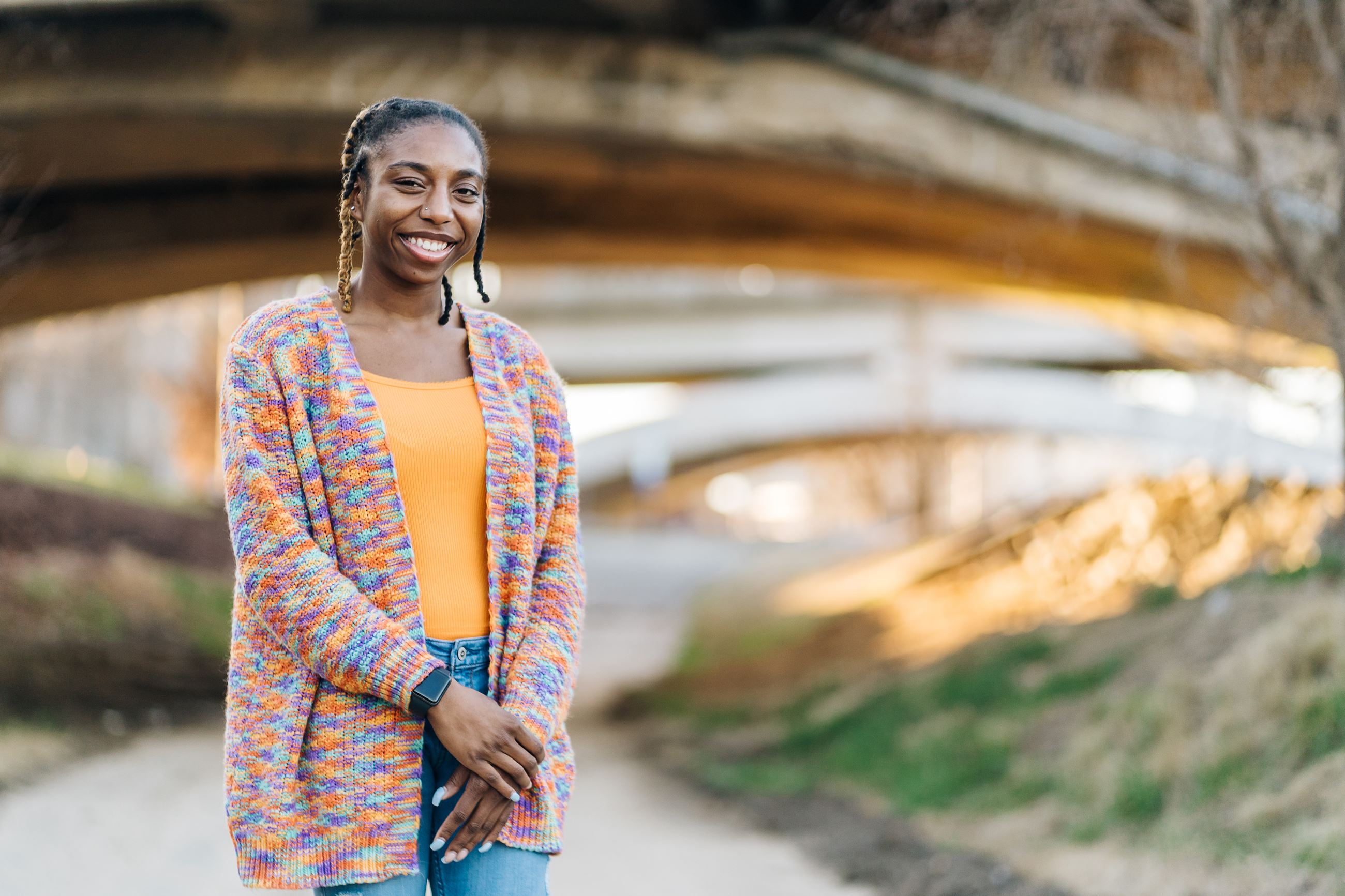 Amyia Totten standing in front of the MLK Bridge