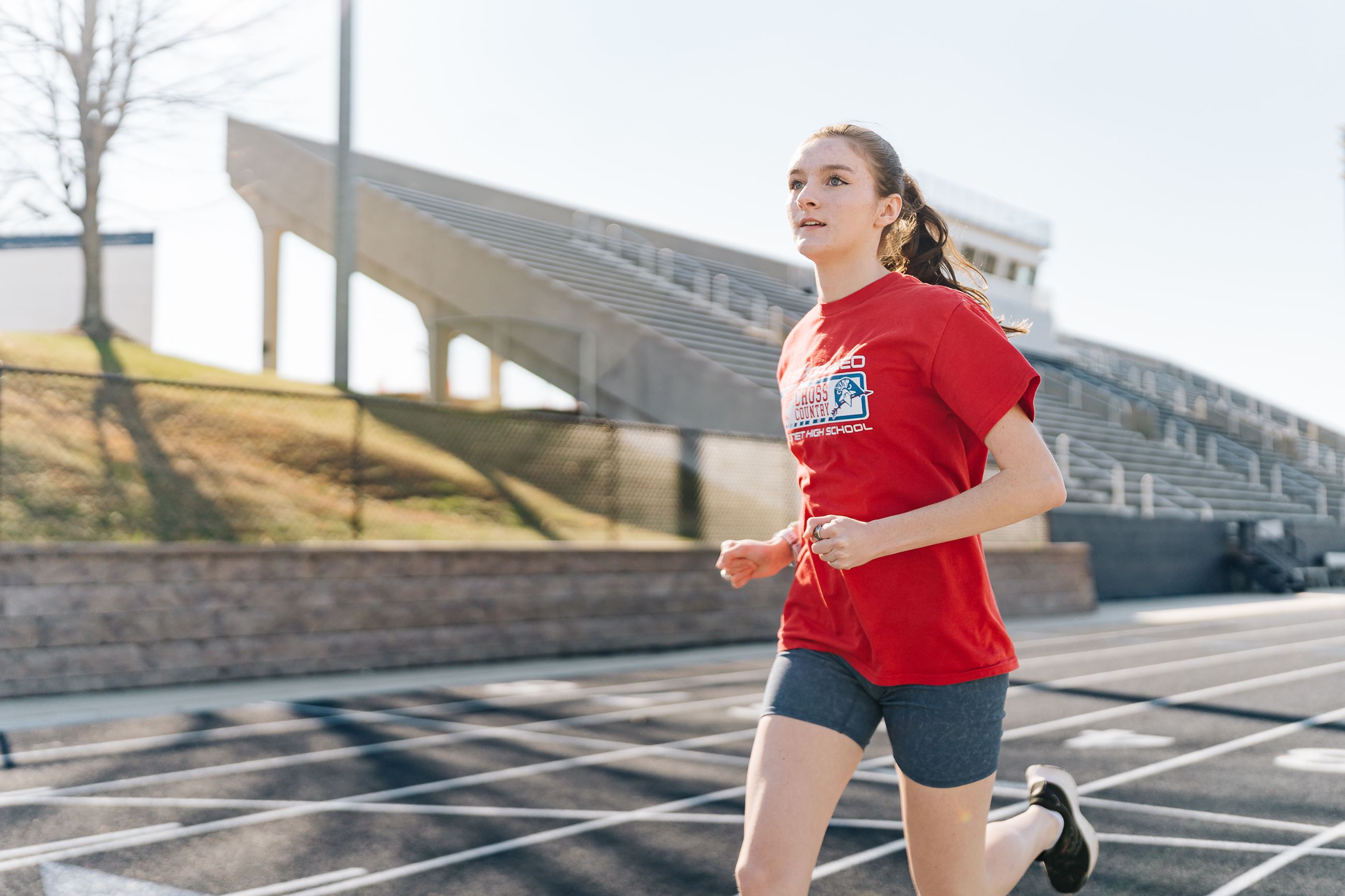 Carol Anne Garrett running on the track