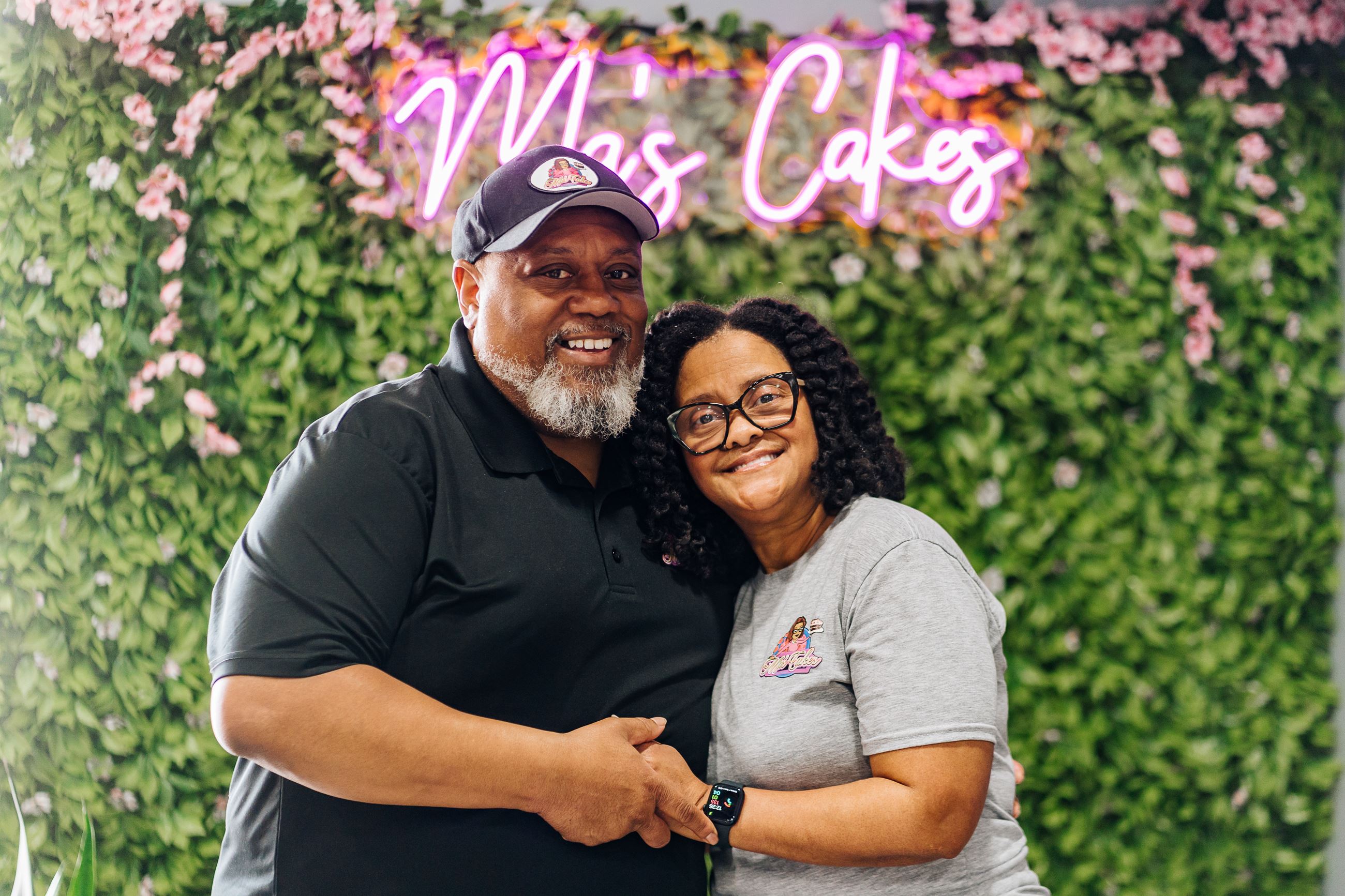 Ma's Cakes owners standing in their bakery