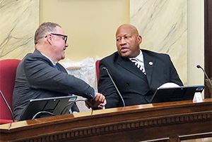 Mayor Jones (right) congratulates Buckner on election as vice mayor.