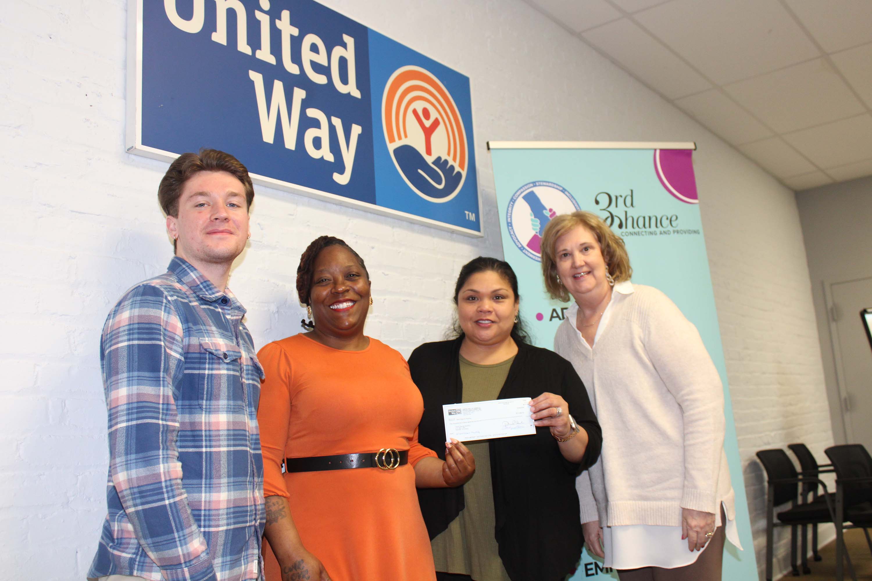 Glass4Good check presentation to Third Chance Housing taken by Charles Wilborn