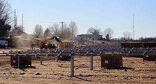 Boxes of panels await installation on first array for the Kentuck solar project.